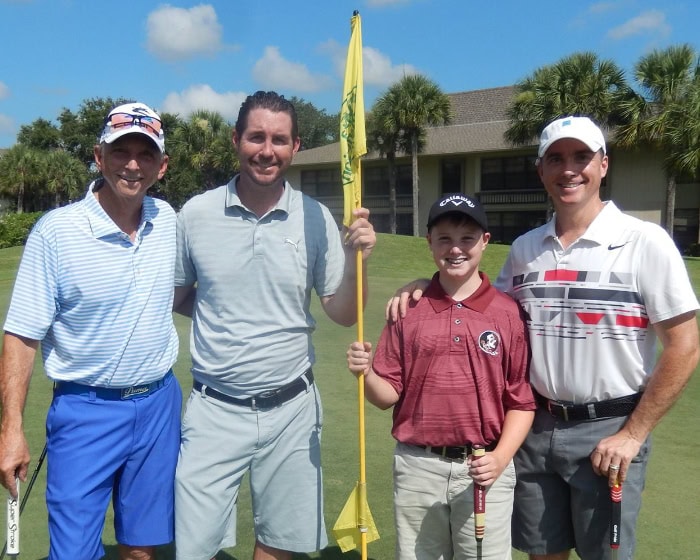 Four people at the founders cup
