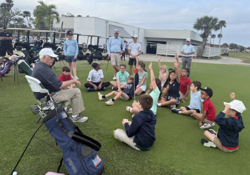 Children asking questions about golf