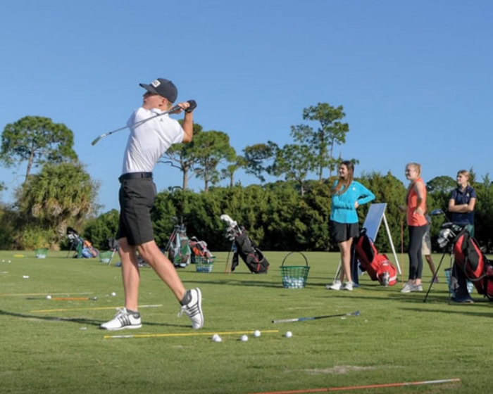 Teen golfer driving range